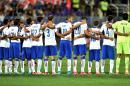 Italy's players observe a minute of silence to pay homage to the deceased of Europe's migrants crisis during the Euro 2016 group H qualifying football match between Italy and Malta on September 3, 2015 at the Artemio Franchi stadium in Florence