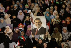Egypt's Brotherhood vows to keep defying coup 880f41e42cb13817370f6a7067005367