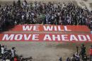 Participants at the COP22 climate conference stage a public show of support for climate negotiations and Paris agreement, on the last day of the conference, in Marrakech, Morocco, Friday, Nov. 18, 2016. (AP Photo/David Keyton)