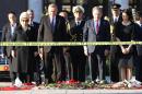 Turkey's President Recep Tayyip Erdogan (2L), Finland's President Sauli Niinisto (2R), and their wives Emine Erdogan (L) and Jenni Haukio attend a wreath-laying ceremony at the site of the bombings in Ankara, on October 14, 2015