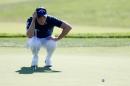 Danny Willett of England was so frustrated with his performance on the greens that he snapped his putter in two late in his third round