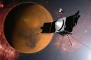 In this artist concept provided by NASA, the MAVEN spacecraft approaches Mars on a mission to study its upper atmosphere. Late Sunday night, Sept. 21, 2014,NASA's Maven spacecraft entered orbit around Mars for an unprecedented study of the red planet's atmosphere following a 442 million-mile journey that began nearly a year ago. (AP Photo/NASA)