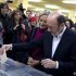 Spain's Socialist candidate Alfredo Perez Rubalcaba, right, and his wife Pilar Goya, center, vote during the Spanish general elections in Madrid on Sunday, Nov. 20, 2011. (AP Photo/Arturo Rodriguez)