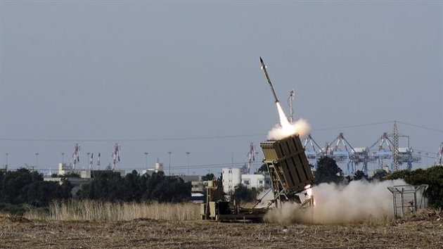 Israel's "Iron Dome" missile defense system intercepts rockets being fired by Hamas - the Palestinian Islamist group that runs the Gaza Strip. Also, scenes from the aftermath of an Israeli strike on a house in Gaza.
