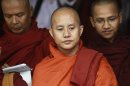 File picture shows Buddhist monk Wirathu, leader of the 969 movement, attending a meeting on the National Protection Law at a monastery outside Yangon