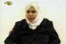 Image grab from Jordanian TV shows Iraqi Sajida Mubarak al-Rishawi, 35, who accompanied her husband on a suicide mission to the Radisson Hotel and failed to detonate her explosive belt, confessing November 13, 2005 about her role in the attacks