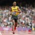 Jamaica's Warren Weir runs to finish first in his men's 200m round 1 heat at the London 2012 Olympic Games at the Olympic Stadium