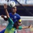 Brazil's Dede and South Africa's McCarthy fight for the ball during their international friendly soccer match in Sao Paulo