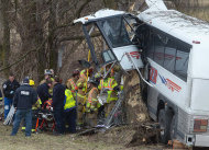 Emergency and rescue crews respond to the scene of a tour bus crash on the Pennsylvania Turnpike on Saturday, March 16, 2013 near Carlisle, Pa. Authorities say the tour bus crashed on the freeway at mile marker 227 in central Pennsylvania, and serious injuries have been reported. Megan Silverstram of the Cumberland County public safety department says the crash in the eastbound lanes of the Pennsylvania Turnpike was reported just before 9 a.m. Saturday. She says there are reports of multiple injuries, including that some are serious. (AP Photo/The Sentinel, Jason Malmont ) MANDATORY CREDIT
