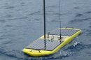 A Wave Glider, a floating platform of sensors with an underwater stabilizers, is seen in this undated handout photo