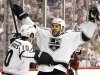 Los Angeles Kings' Dwight King (74) celebrates his goal against the Phoenix Coyotes with teammate Mike Richards (10) during the second period of Game 1 of the NHL hockey Stanley Cup Western Conference finals, Sunday, May 13, 2012, in Glendale, Ariz.(AP Photo/Ross D. Franklin)
