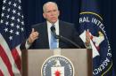 Central Intelligence Agency Director John Brennan, pictured here during a press conference at CIA headquarters in Langley, Virginia on December 11, 2014, has proposed changes to ramp up cyber threat capability and integration between departments