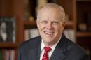 This 2011 photo release by Stanford News Service shows Stanford University President John Hennessy. The San Jose Mercury News reports that Hennessy announced on Thursday, June 11, 2015 at the university's Faculty Senate meeting that he will leave in the summer of 2016 in favor of research and teaching. (Linda A. Cicero/Stanford News Service via AP)