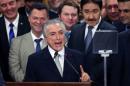Brazil's interim President Michel Temer addresses the audience during his first public remarks after the Brazilian Senate voted to impeach President Dilma Rousseff at the Planalto Palace in Brasilia