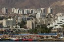 FILE - In this Jan. 30, 2007, file photo, a general view of the Red Sea resort city of Eilat is seen in southern Israel on the border with Egypt. Israel's military said Thursday, Aug. 8, 2013, it has ordered the closure of the airport in the Red Sea resort of Eilat, citing unspecified security reasons. (AP Photo/Ariel Schalit, File)