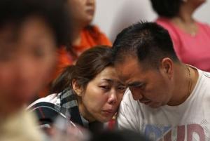 Family of passengers onboard AirAsia flight QZ8501 &hellip;