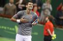 Serbia's Novak Djokovic reacts after winning against Britain's Andy Murray during their final tennis match at the ATP Qatar Open in Doha on January 7, 2017