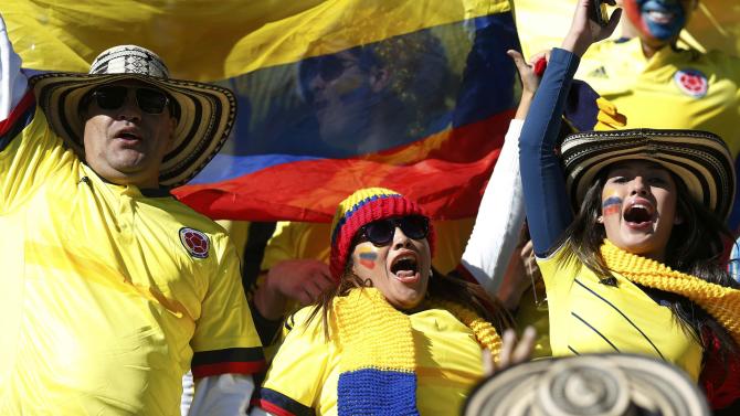 Colombia fans celebrate ahead of their team&#39;s first round Copa America 2015 soccer match against Venezuela at Estadio El Teniente in Rancagua
