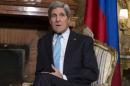 U.S. Secretary of State Kerry talks before meeting Russia's Foreign Minister Lavrov at Villa Taverna in Rome