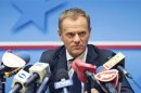 Poland's PM Tusk addresses a news conference after an European Union leaders summit in Brussels