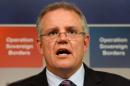 Australian Immigration Minister Scott Morrison speaks during a press conference in Sydney on September 30, 2013