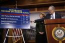 Senators Schumer and Stabenow respond to Republicans at a Democrat response news conference after vote on amendments on the Keystone XL pipeline bill in Washington