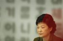 Park Geun-hye, South Korea's ruling Saenuri Party's presidential candidate, listens to a reporter's question during a news conference at the Seoul Foreign Correspondents' Club in Seoul
