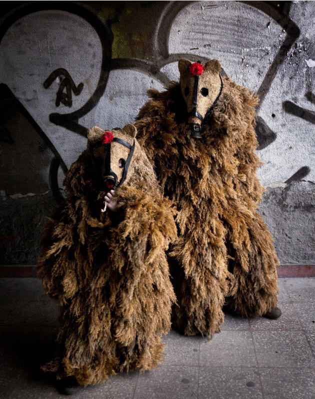 Wearing fearsome masks and imposing costumes                        these fantastical creatures make a terrifying                        sight. These costumed men are taking part in the                        ancient ritual of Kukeri at the Surva                        International Festival