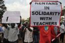 People shout slogans on September 23, 2015 in Nairobi during a demontration called by opposition leaders to express solidarity with Kenyan teachers