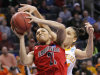 Louisville's Bria Smith, front, is fouled by Tennessee's Cierra Burdick, back, during the first half of the Oklahoma City regional final in the NCAA women's college basketball tournament in Oklahoma City, Tuesday, April 2, 2013. (AP Photo/Alonzo Adams)