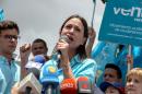 Venezuelan opposition leader Maria Corina Machado delivers a speech outside the National Electoral Council in Los Teques on August 3, 2015