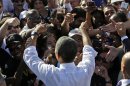 President Barack Obama greets supporters at a campaign event at Cheyenne Sports Complex in Las Vegas, Thursday, Nov. 1, 2012. (AP Photo/Pablo Martinez Monsivais)