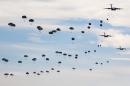 U.S. Paratroopers from the 82nd Airborne Division participate in a massive airdrop from C-17 Globemaster aircraft as part of the NATO Exercise Trident Juncture 2015 military exercise, at the San Gregorio training grounds outside Zaragoza