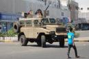 Yemeni security forces patrol the streets of Aden during a protest calling for southern independence on February 21, 2013