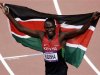 Kenya's David Lekuta Rudisha holds his national flag after winning the men's 800m final during the London 2012 Olympic Games
