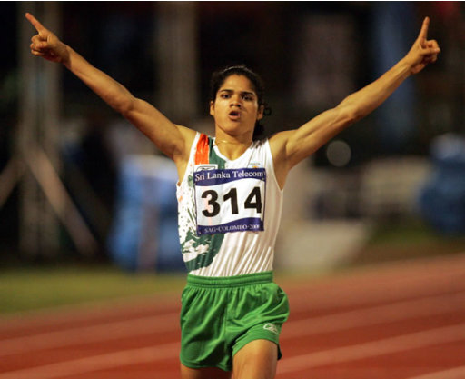 Pinki Pramanik, ex-corredora indiana, durante vitória no revezamento 4x400m dos Jogos Asiáticos de 2006 (Foto: AP)