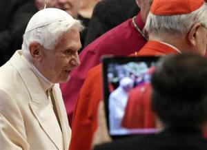 A faithful takes a picture as former pope Benedict&nbsp;&hellip;