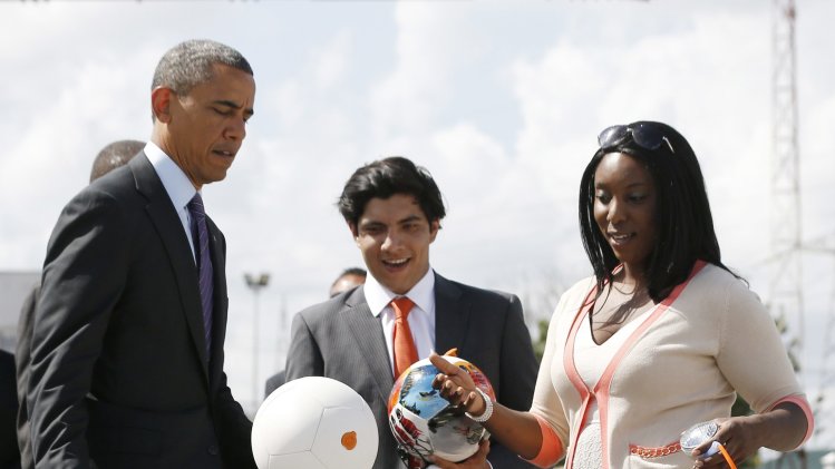 U.S. President Obama kicks a soccer ball at Ubungo Power Plant in Dar es Salaam