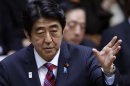 Japan's PM Abe speaks during an upper house budget committee session in Tokyo