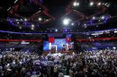 Delegates celebrate Romney securing nomination during second day of the Republican National Convention in Tampa