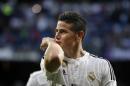 Real Madrid's James Rodriguez from Colombia celebrates after scoring a goal during a Spanish La Liga soccer match between Real Madrid and Almeria at the Santiago Bernabeu stadium in Madrid, Spain, Wednesday, April 29, 2015. (AP Photo/Daniel Ochoa de Olza)