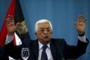 Palestinian President Mahmoud Abbas gestures as he speaks to the media in the West Bank city of Ramallah