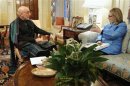 Karzai sits with Clinton in her outer office at the State Department in Washington