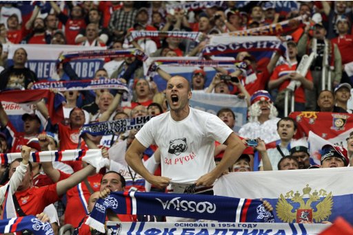 Russian fans cheer before the Euro 2012, Group A soccer match between Russia and Czech Republic, in Wroclaw, Poland, Friday, June 8, 2012. (AP Photo/Sergey Ponomarev)