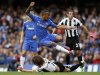 Chelsea's Bertand challenges Newcastle United's Coloccini during their English Premier League soccer match at Stamford Bridge in London