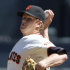 San Francisco Giants pitcher Matt Cain throws to the Los Angeles Dodgers during the first inning of a baseball game in San Francisco, Saturday, Sept. 8, 2012. (AP Photo/George Nikitin)