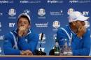 Europe's Rory McIlroy, left, and Sergio Garcia attend a press conference during the first day of the Ryder Cup golf tournament at Gleneagles, Scotland, Friday, Sept. 26, 2014. (AP Photo/Scott Heppell)