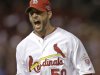 St. Louis Cardinals starting pitcher Adam Wainwright reacts after getting San Francisco Giants' Pablo Sandoval to ground out and end the sixth inning of Game 4 of baseball's National League championship series Thursday, Oct. 18, 2012, in St. Louis. (AP Photo/David J. Phillip)