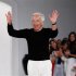 Designer Ralph Lauren waves after presenting his Spring/Summer 2013 collection during New York Fashion Week