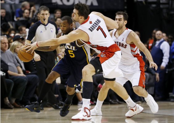 Raptors' Bargnani steals the ball from Jazz's Williams during their NBA basketball game in Toronto